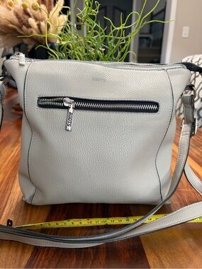 Roots Light Gray Pebbled Leather Crossbody Bag. The best purses 👜 Canada 🇨🇦